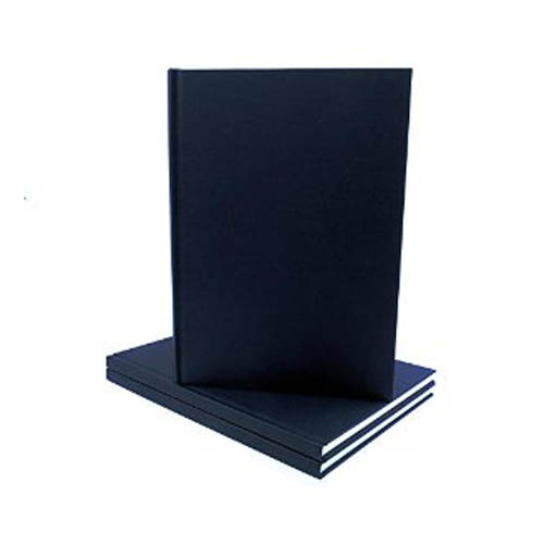 A handful of sketchbooks on a table