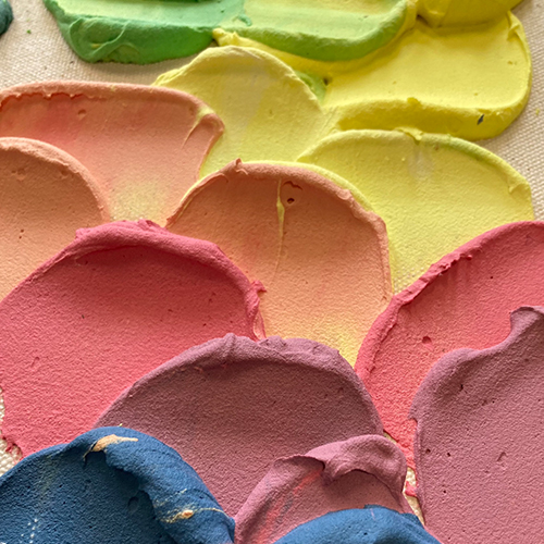 Thick, coloured layers of sand-textured paint