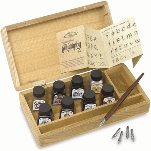a nice wooden box holding eight ink bottles, a woo